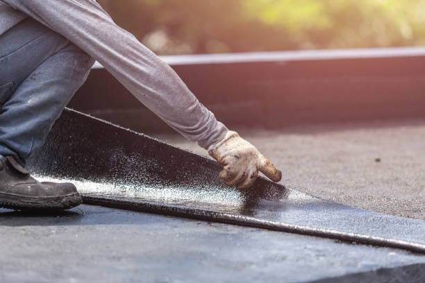 Professional Basement Waterproofing technician working in Corning, NY